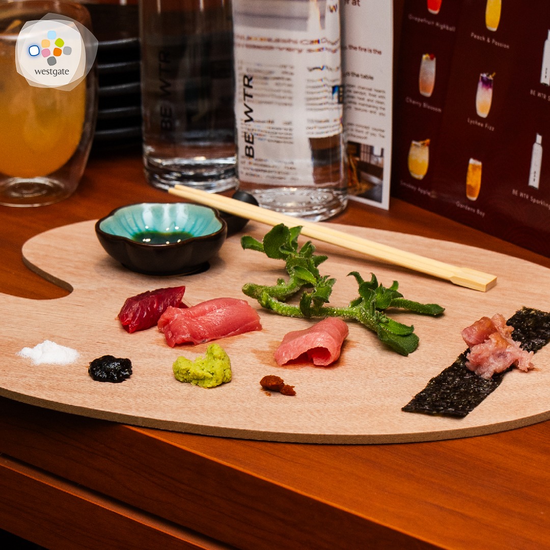 Guests enjoying the vibrant atmosphere at Sushi Zushi, Charcoal Grill & Sushiya