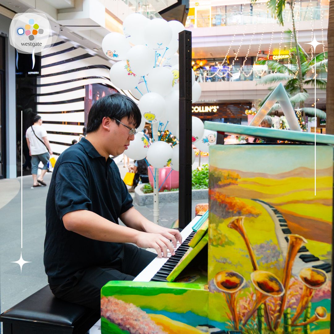 People interacting with a piano at a Yamaha Global LovePiano event