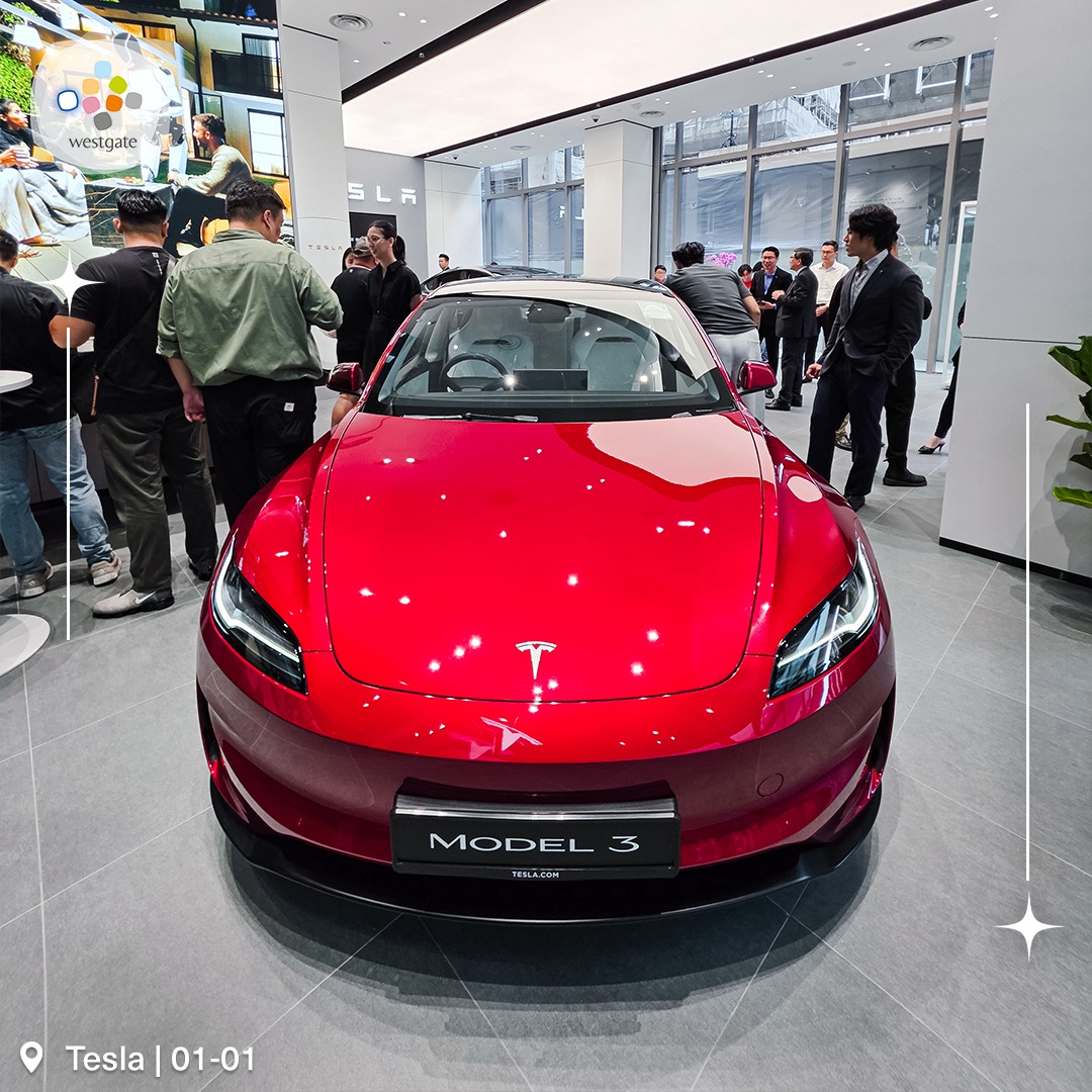 Customers exploring the new Tesla space at Westgate