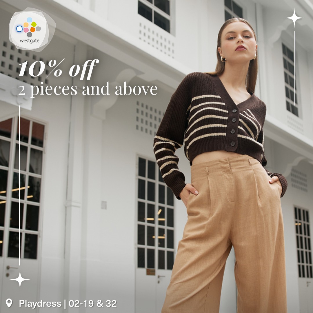 Person enjoying a refreshing beverage at their desk